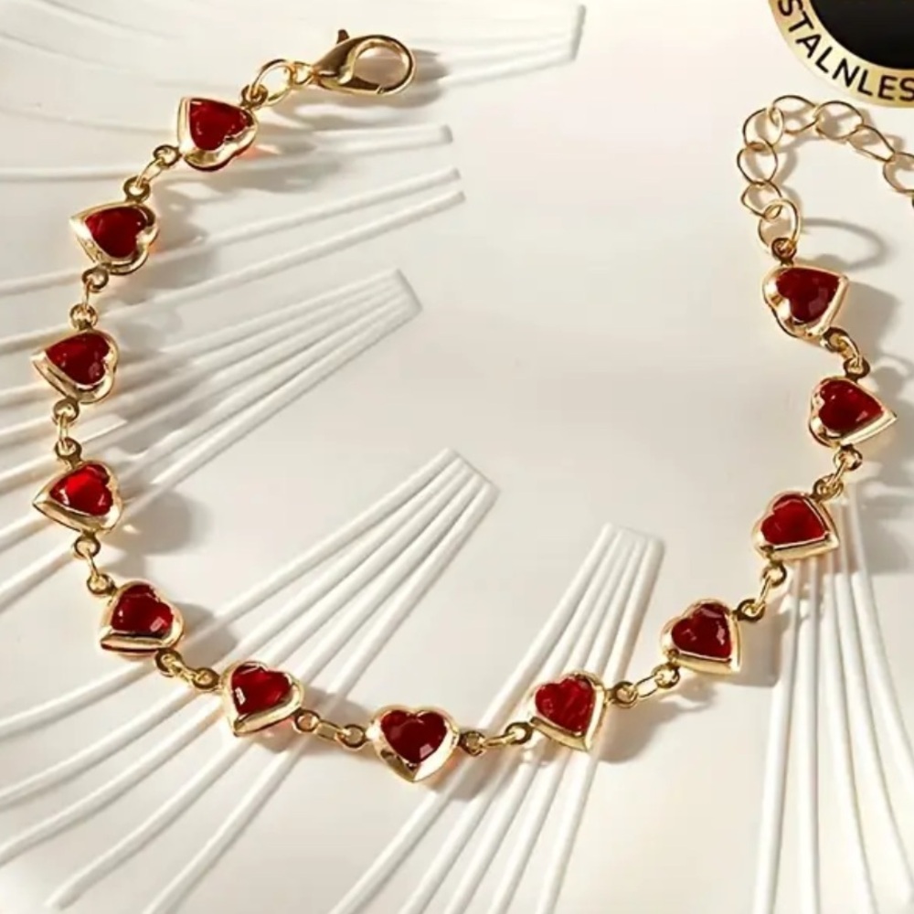 Gold Bracelet with Red Heart Accents